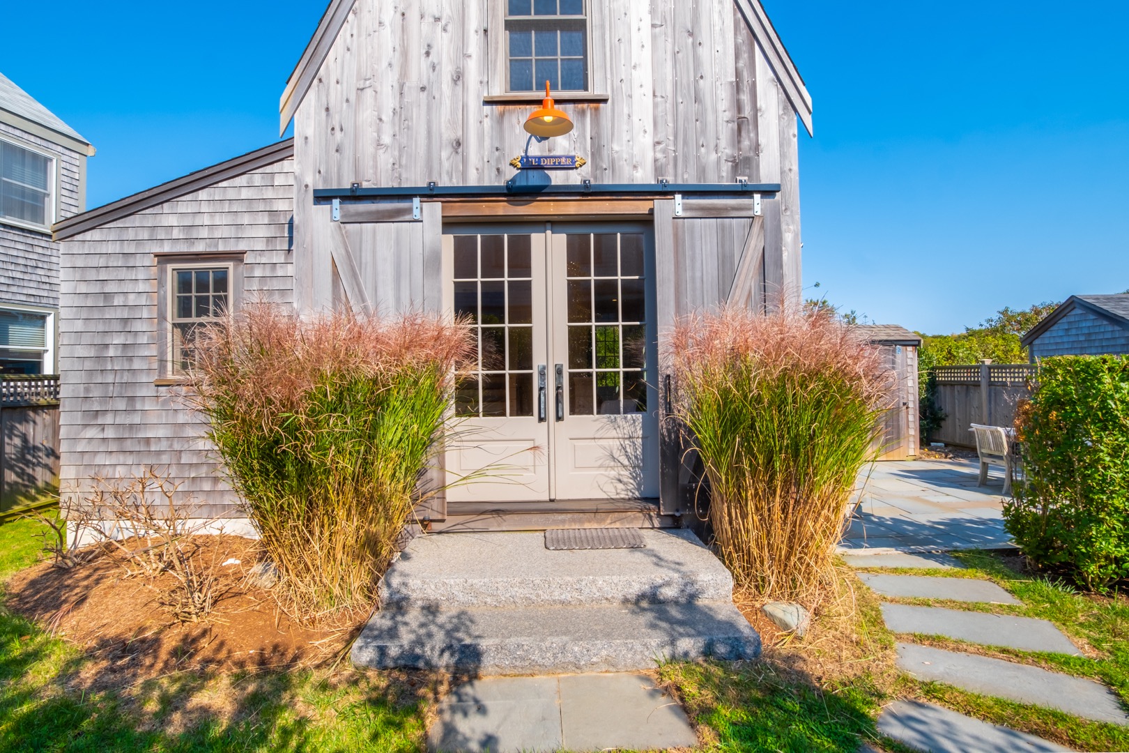 33.5 Vesper Lane Nantucket, MA 02554 - Photo 40 of 55 a front view of a house with a yard