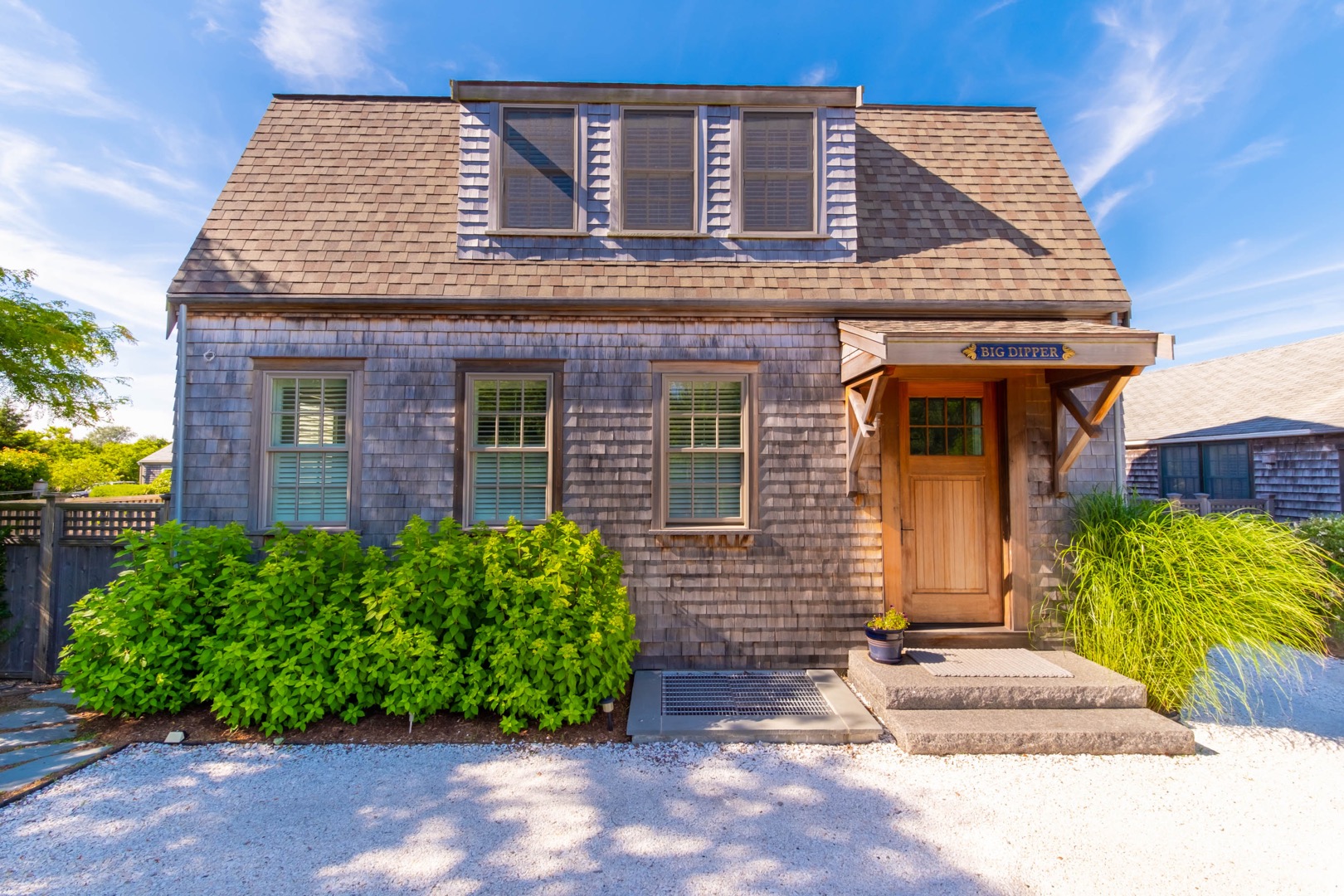 33.5 Vesper Lane Nantucket, MA 02554 - Photo 4 of 55 a front view of a house with garden