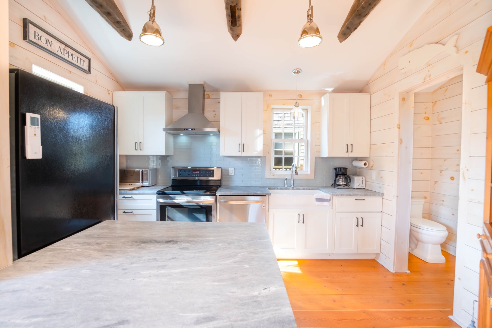 33.5 Vesper Lane Nantucket, MA 02554 - Photo 43 of 55 a large kitchen with cabinets appliances and a counter space