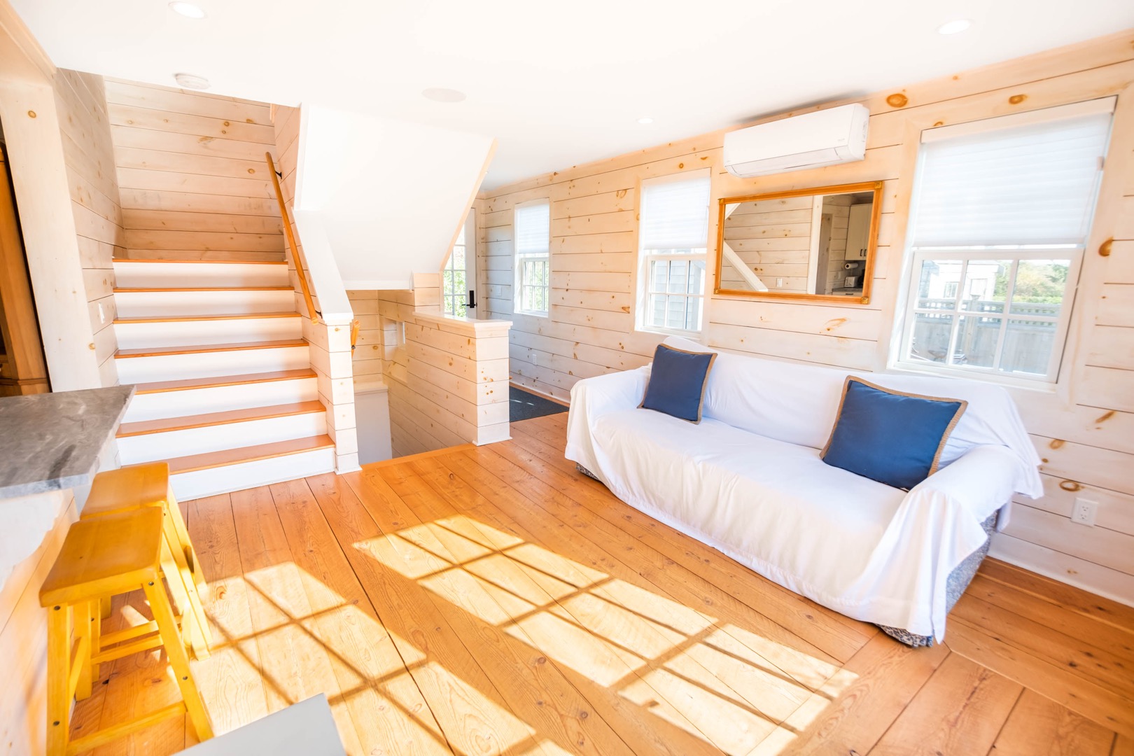 33.5 Vesper Lane Nantucket, MA 02554 - Photo 47 of 55 a bedroom with a bed and wooden floor