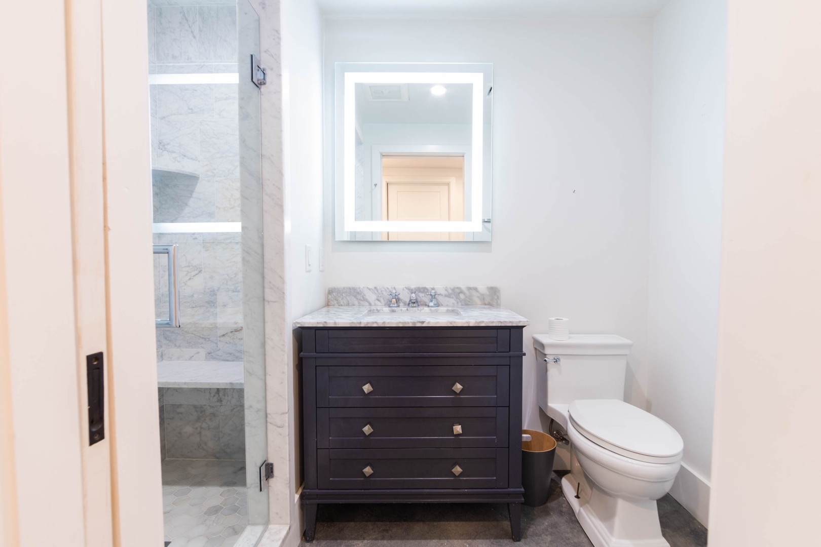 33.5 Vesper Lane Nantucket, MA 02554 - Photo 51 of 55 a bathroom with a toilet a sink and mirror