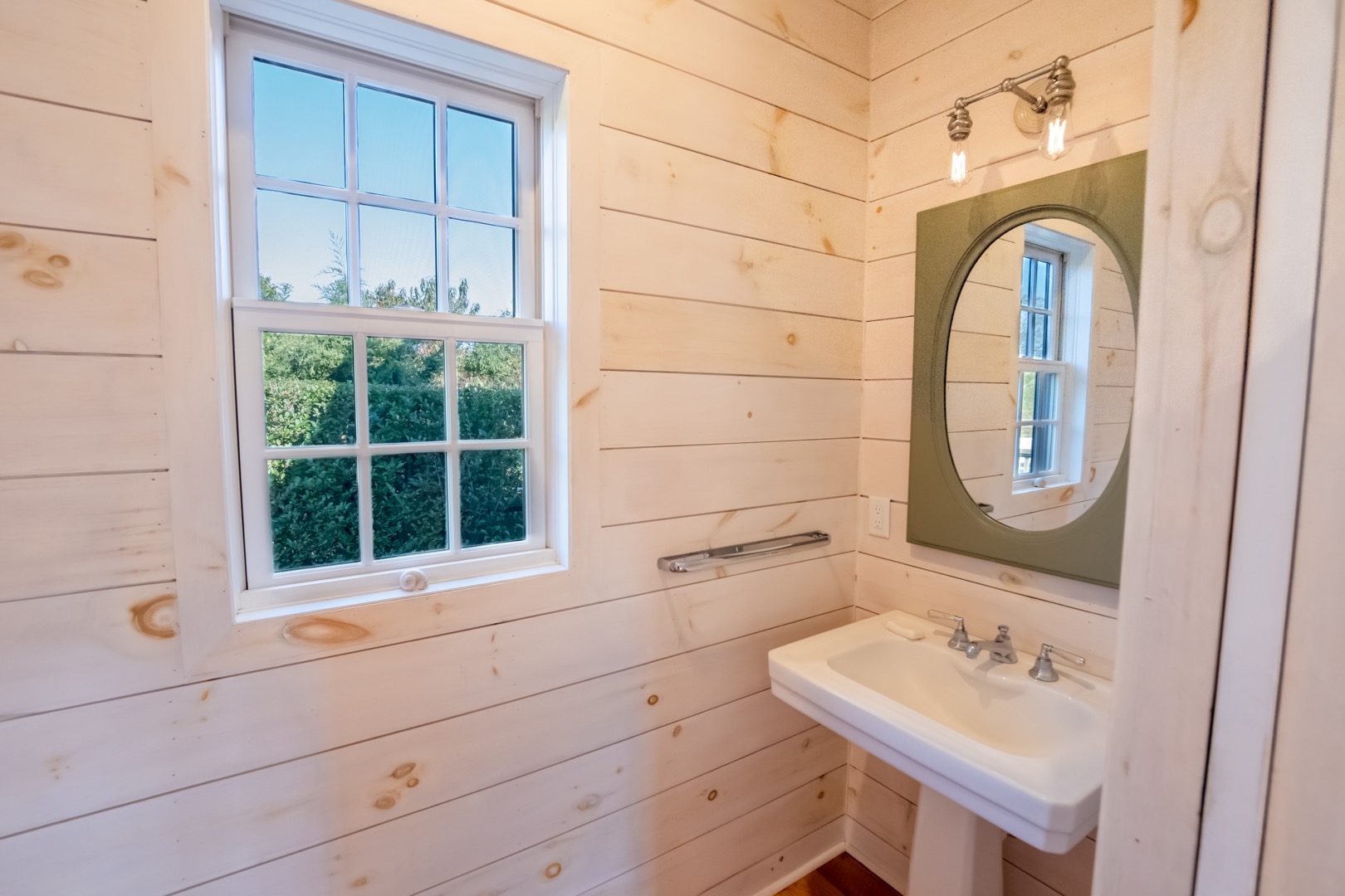 33.5 Vesper Lane Nantucket, MA 02554 - Photo 53 of 55 a bathroom with a sink a mirror and a window