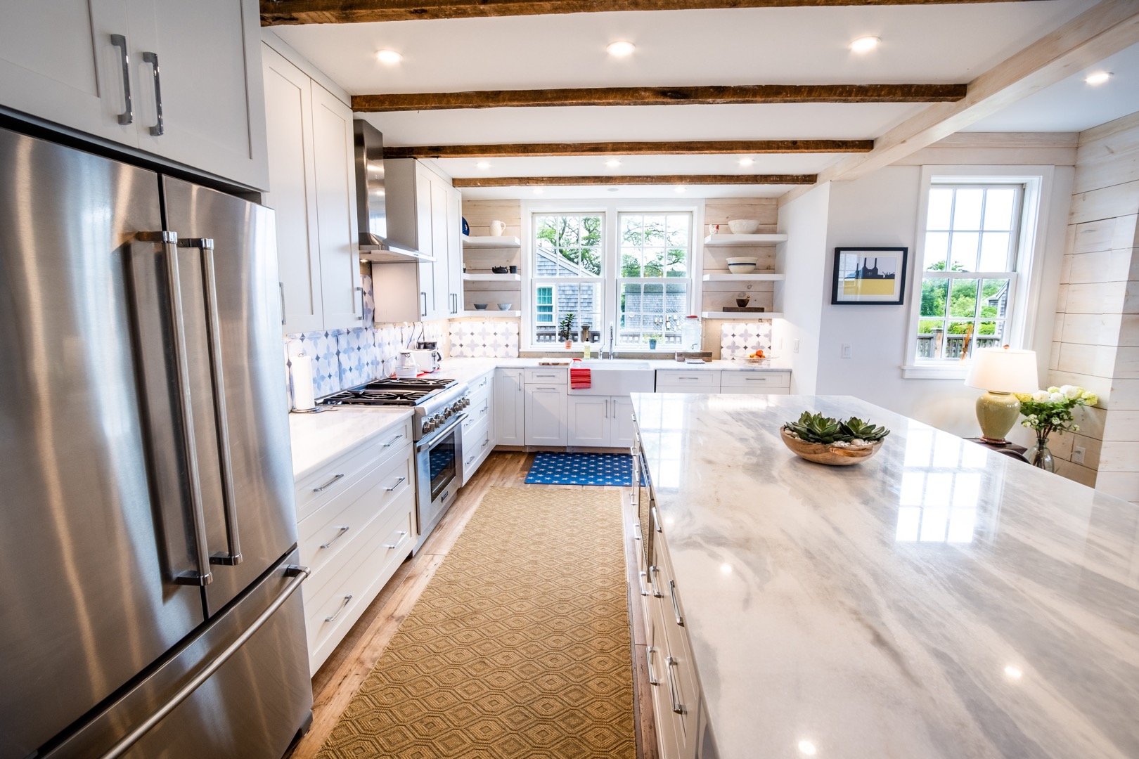 33.5 Vesper Lane Nantucket, MA 02554 - Photo 8 of 55 a kitchen with stainless steel appliances a stove a refrigerator and a view of living room