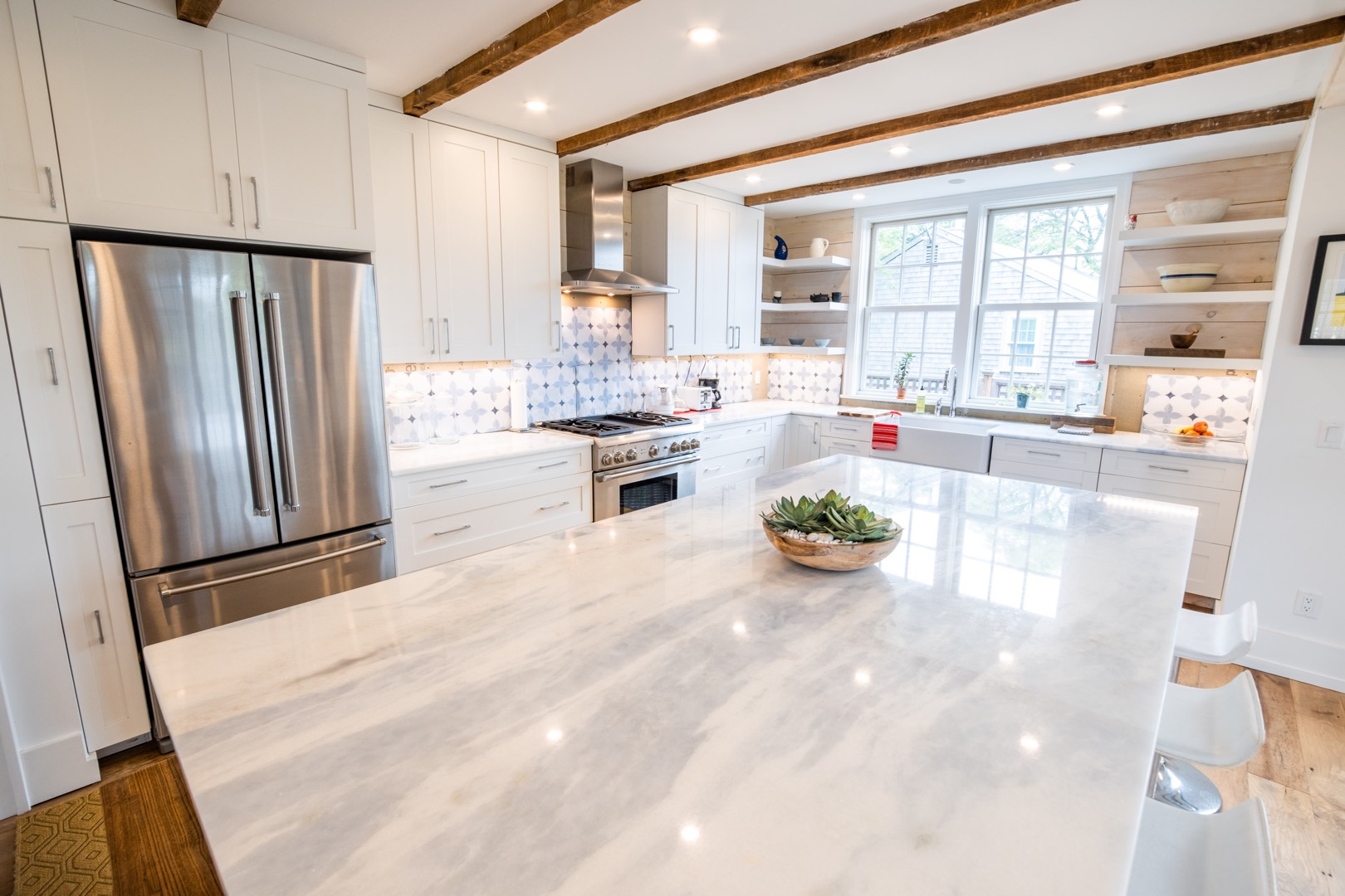 33.5 Vesper Lane Nantucket, MA 02554 - Photo 10 of 55 a large white kitchen with a large window