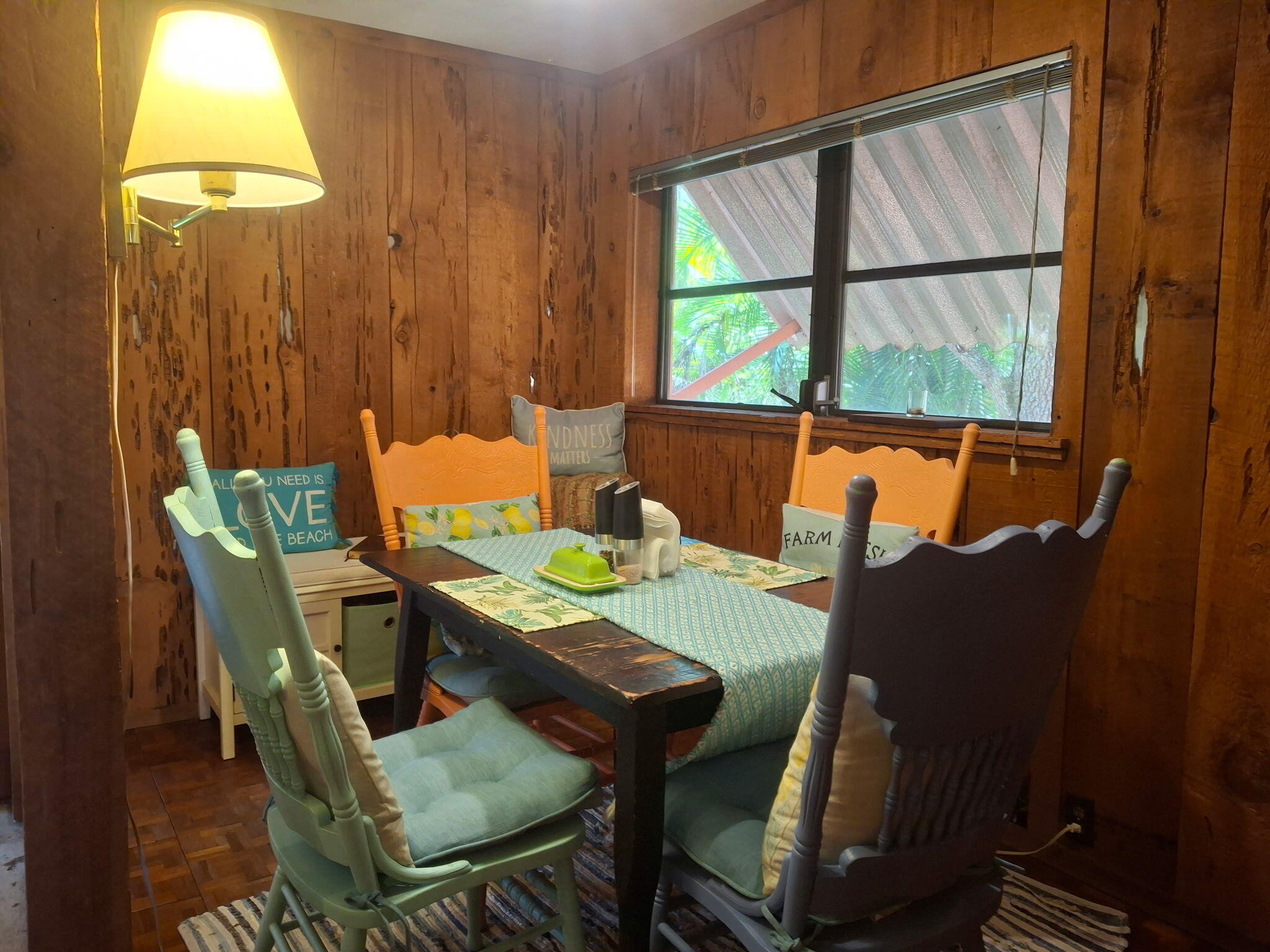 4820 Southwest 11th Street Plantation, FL 33317 - Photo 12 of 14 a view of a dining room with furniture and a window