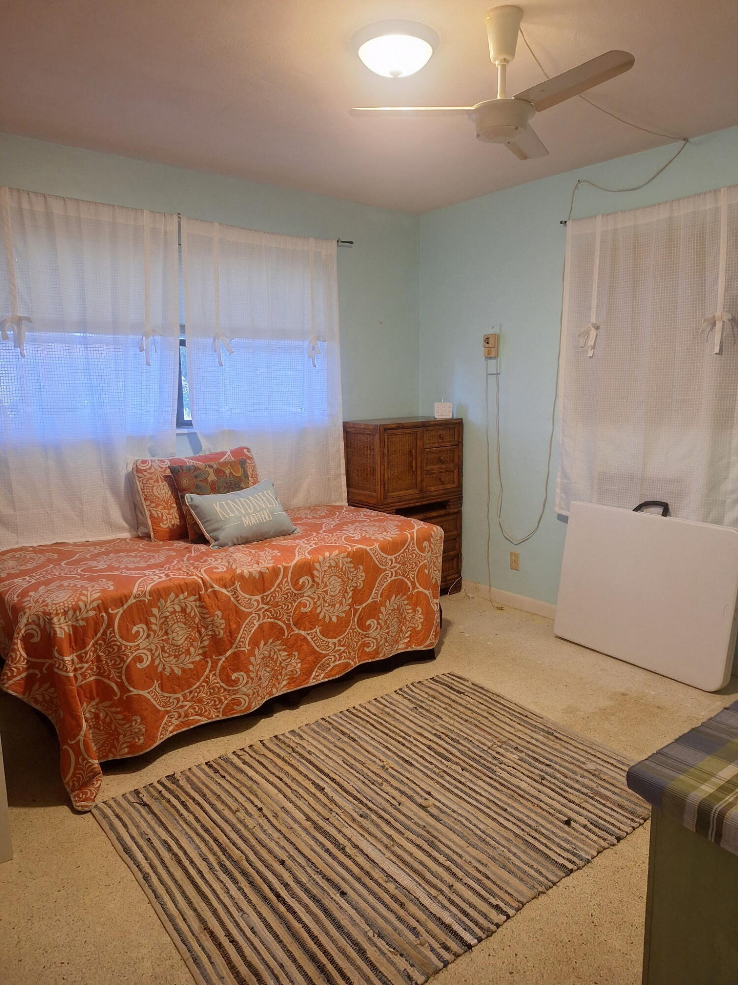 4820 Southwest 11th Street Plantation, FL 33317 - Photo 8 of 14 a bedroom with a large bed and a walk in closet