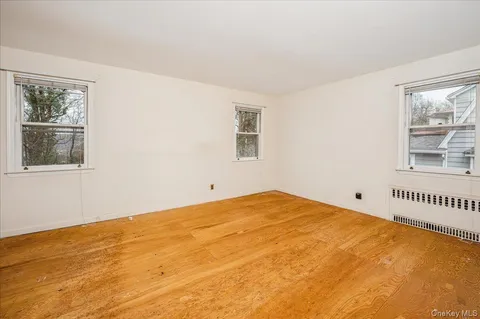 a view of an empty room and window
