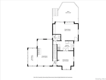 a picture of a bench in front of a wall