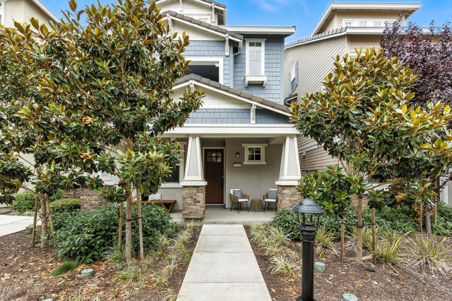 3410 Pyramid Way Mountain View, CA 94043 - Photo 1 of 1 a front view of a house with garden