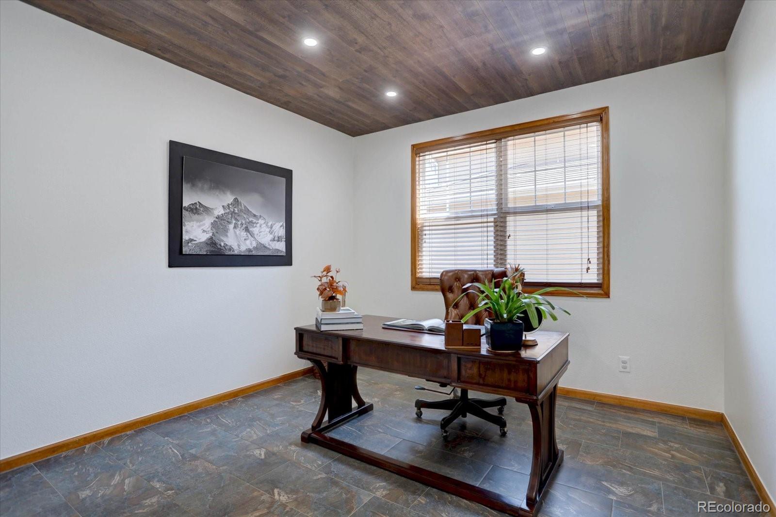 2795 Rockbridge Circle Highlands Ranch, CO 80129 - Photo 19 of 49 a workspace with furniture