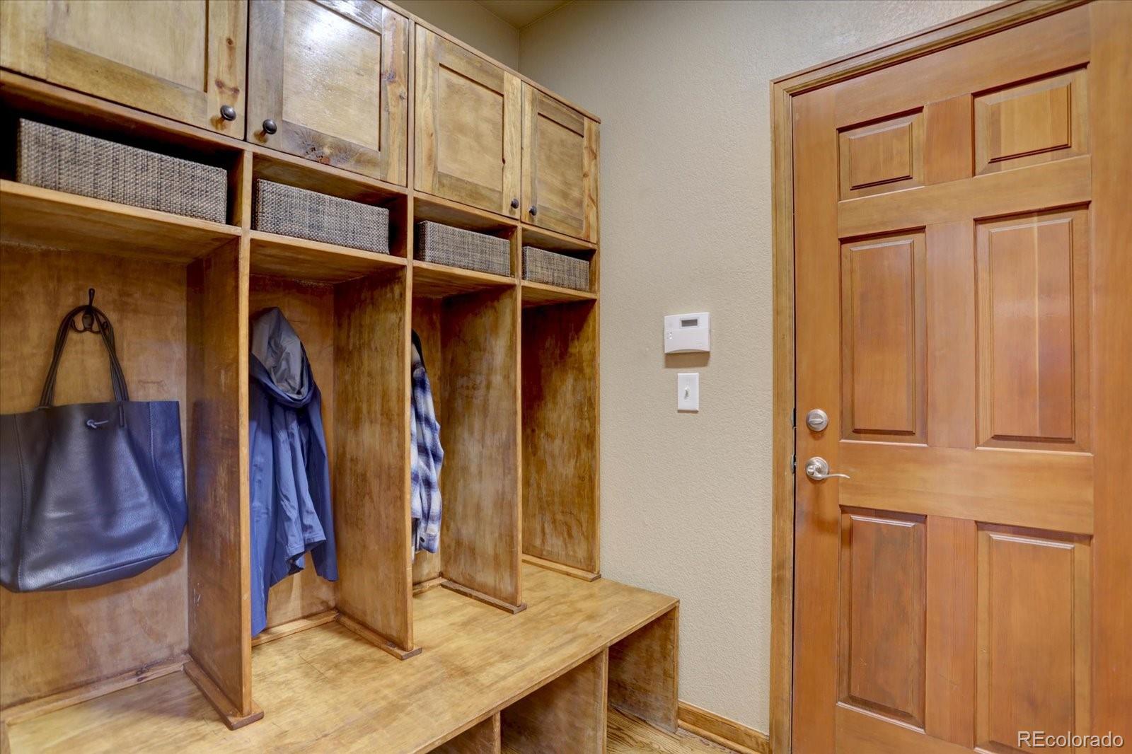 2795 Rockbridge Circle Highlands Ranch, CO 80129 - Photo 22 of 49 a view of walk in closet with clothes