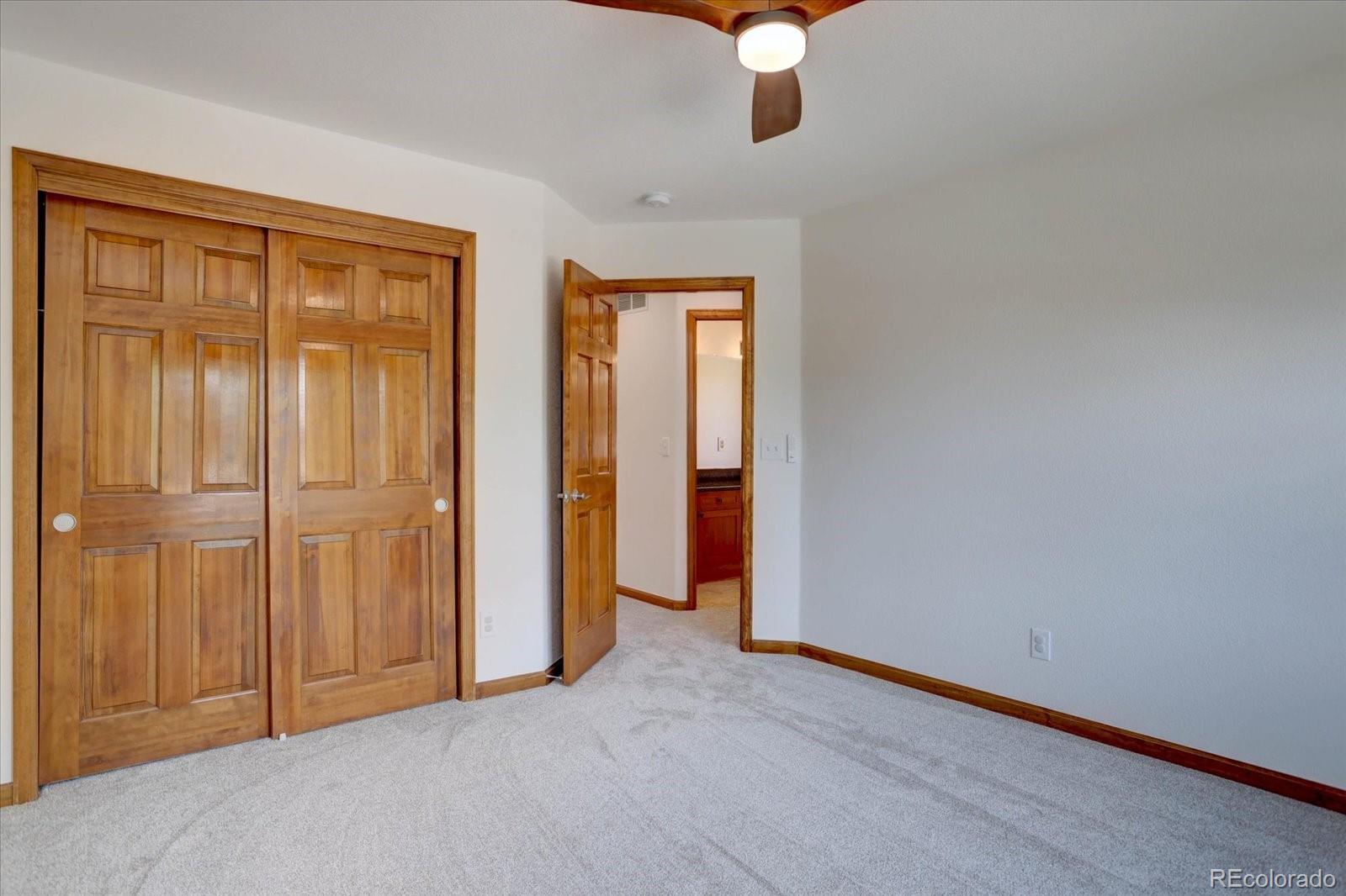 2795 Rockbridge Circle Highlands Ranch, CO 80129 - Photo 32 of 48 an empty room with closet area
