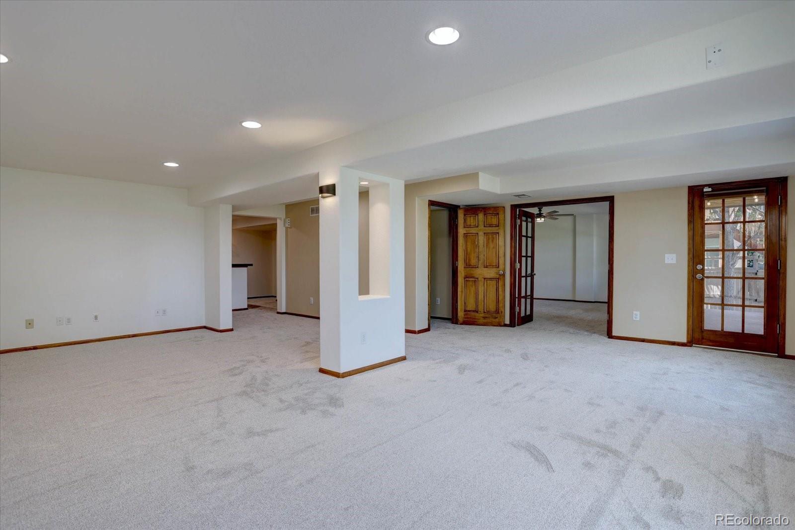 2795 Rockbridge Circle Highlands Ranch, CO 80129 - Photo 36 of 49 an empty room with closet and natural light