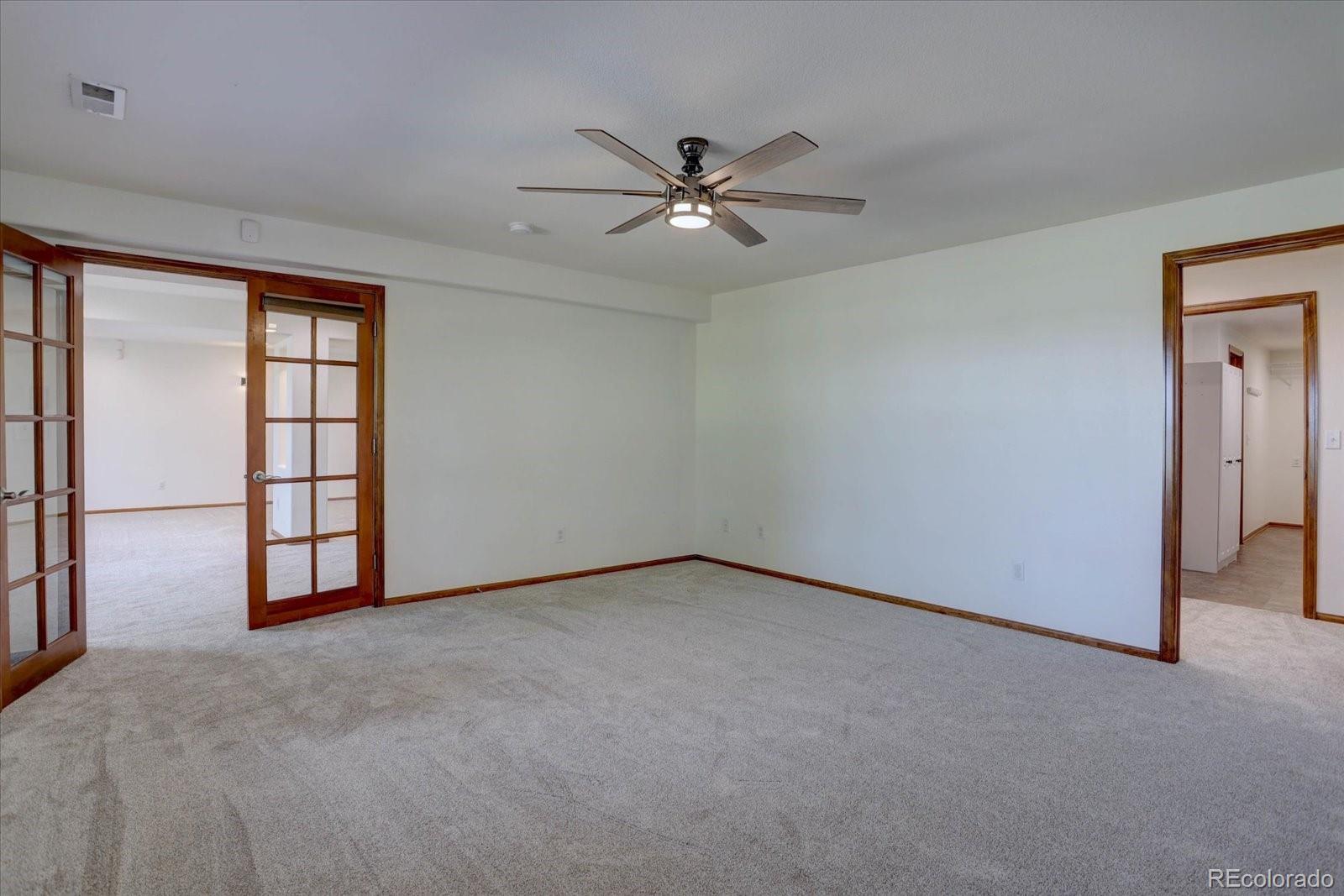 2795 Rockbridge Circle Highlands Ranch, CO 80129 - Photo 38 of 49 a view of an empty room with a window