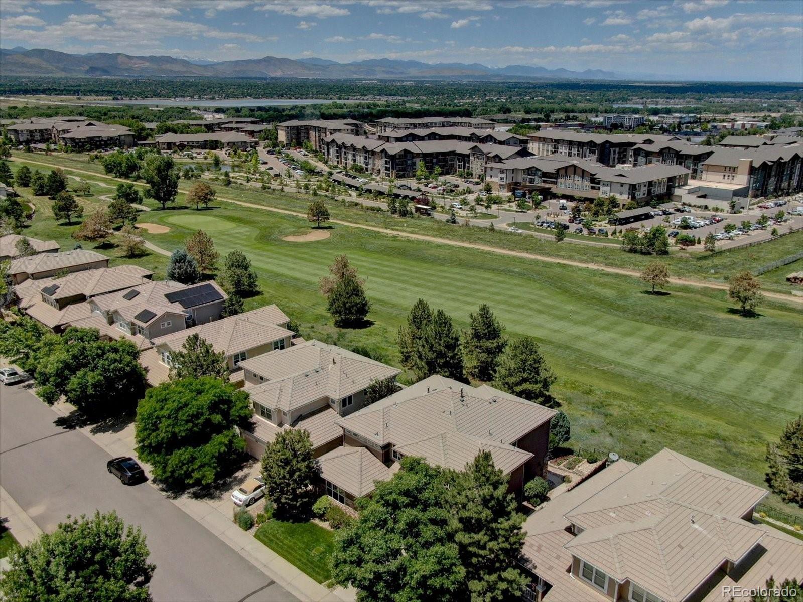 2795 Rockbridge Circle Highlands Ranch, CO 80129 - Photo 49 of 49 an aerial view of a house with a yard
