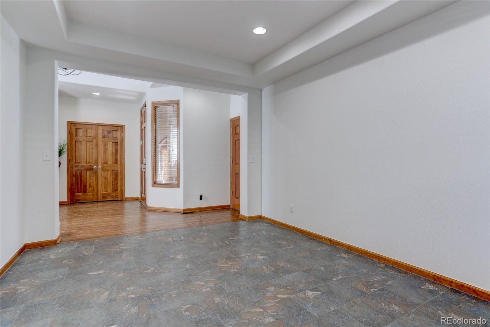 2795 Rockbridge Circle Highlands Ranch, CO 80129 - Photo 10 of 48 an empty room with closet and windows