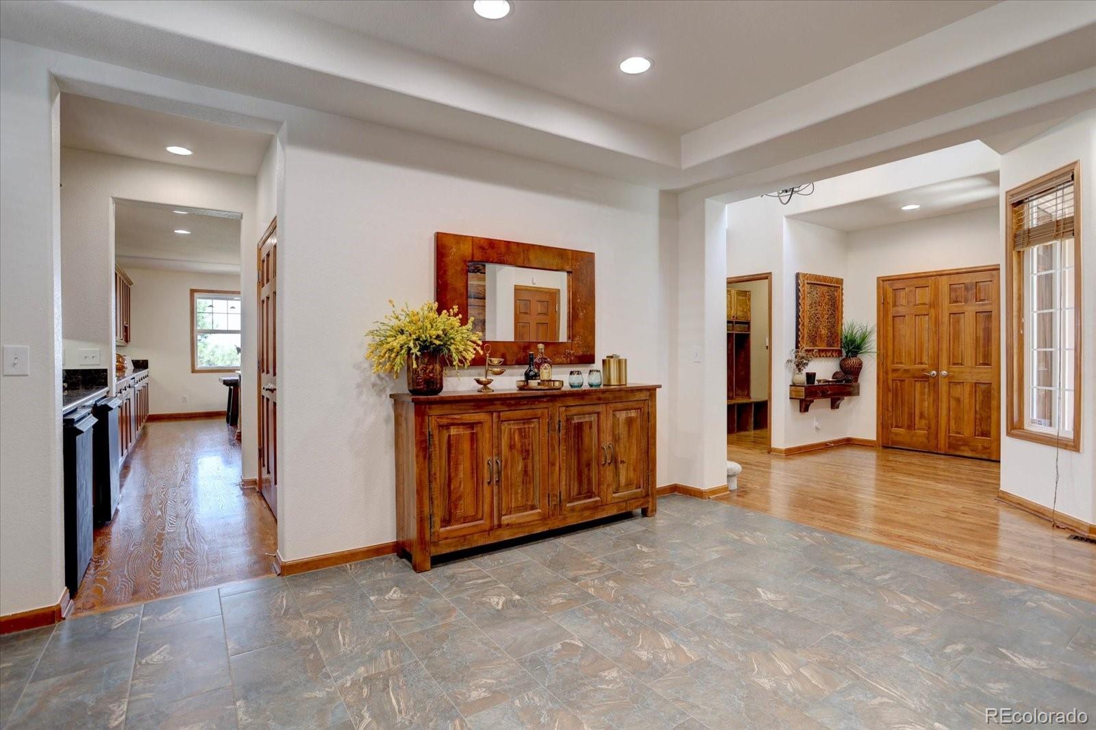 2795 Rockbridge Circle Highlands Ranch, CO 80129 - Photo 10 of 49 a view of a hallway with bathroom and mirror