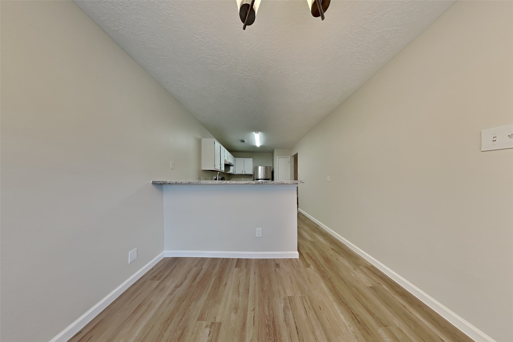 30806 Melita Drive Spring, TX 77386 - Photo 6 of 18 a view of empty room with wooden floor