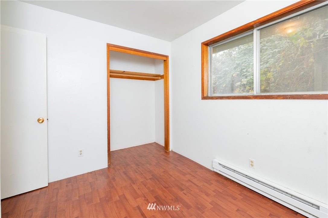 9641 Delta Line Road Blaine, WA 98230 - Photo 14 of 26 a view of an empty room with a window