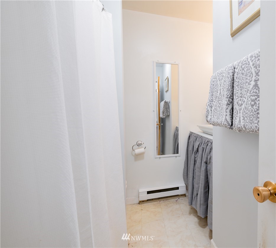 9641 Delta Line Road Blaine, WA 98230 - Photo 15 of 26 a view of walk in closet with clothes and shoes