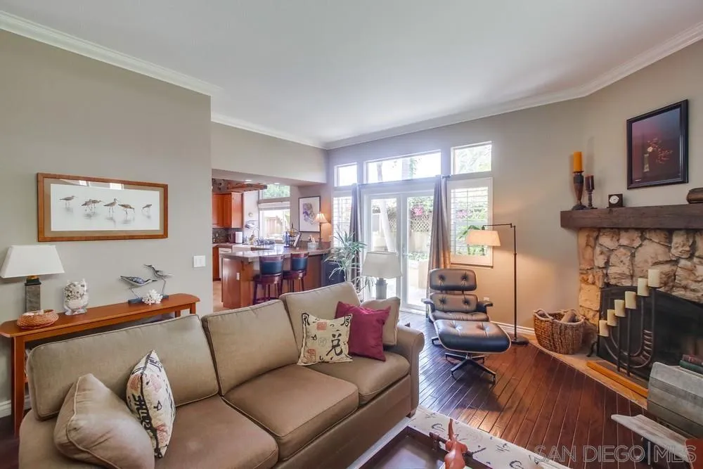 930 Gardena Road Encinitas, CA 92024 - Photo 14 of 40 a living room with furniture fireplace and a large window