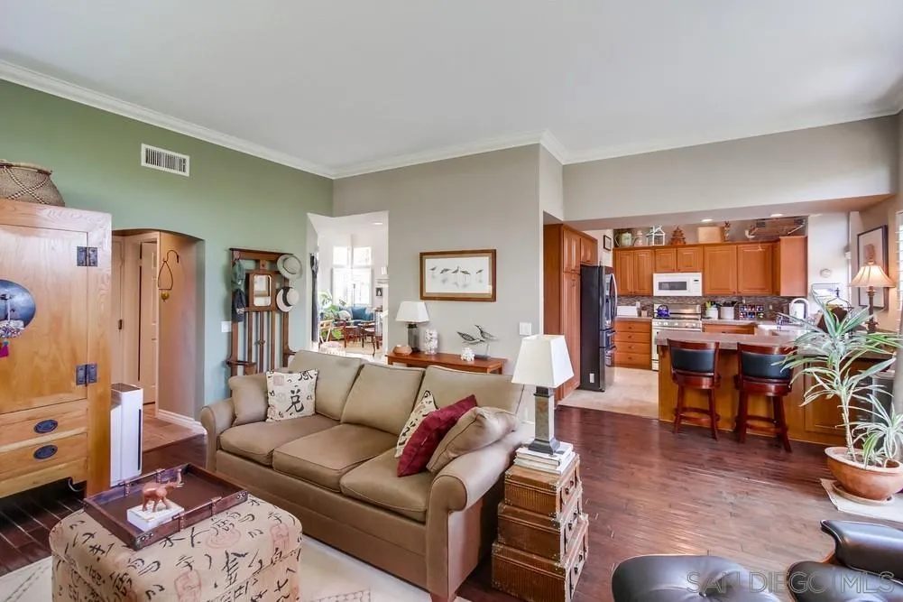 930 Gardena Road Encinitas, CA 92024 - Photo 15 of 40 a living room with furniture and a large window