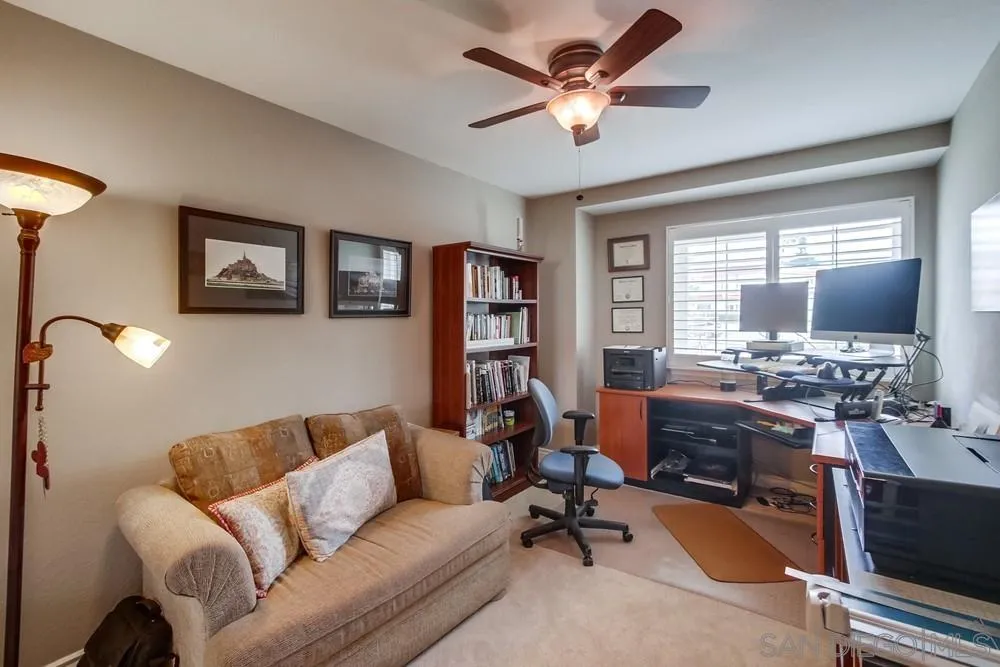 930 Gardena Road Encinitas, CA 92024 - Photo 31 of 40 a view of a livingroom with workspace and a couch