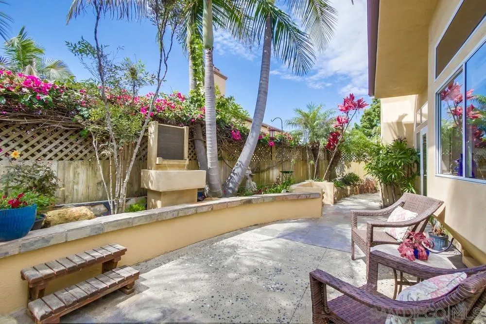 930 Gardena Road Encinitas, CA 92024 - Photo 37 of 40 a house view with a seating space and garden