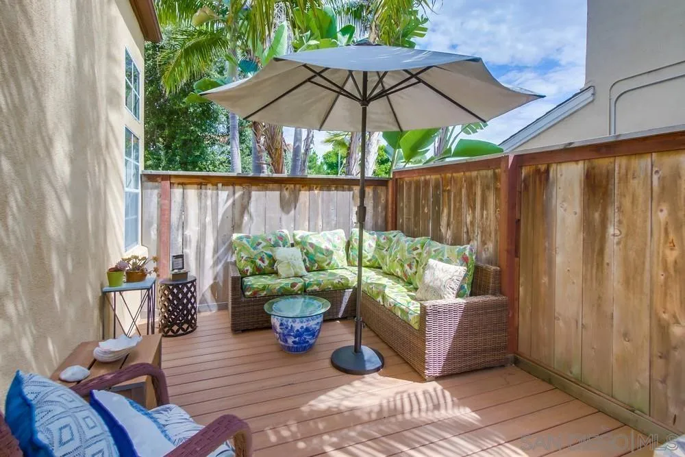 930 Gardena Road Encinitas, CA 92024 - Photo 40 of 40 a view of a backyard with furniture and lots of potted plants