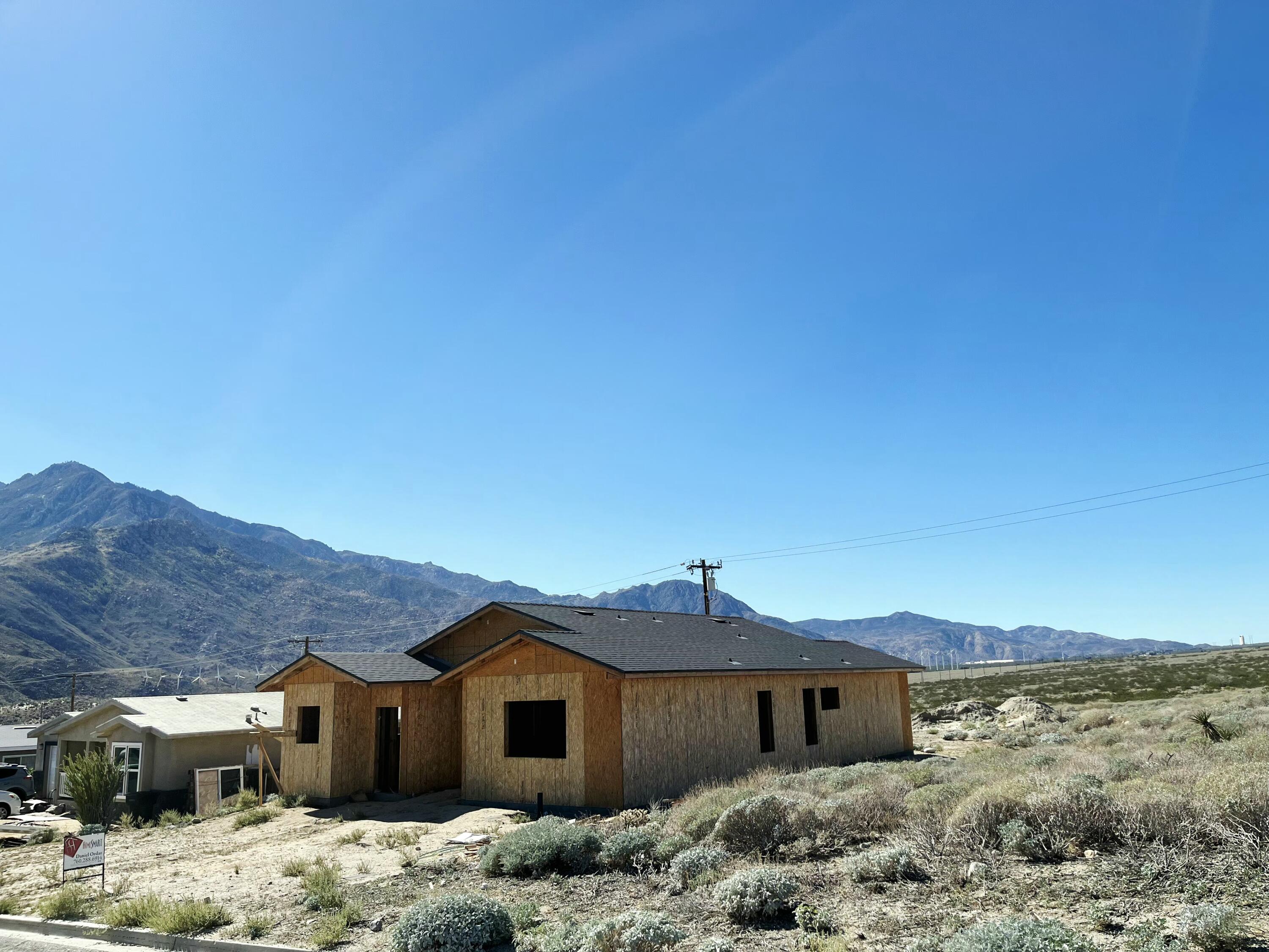 13283 Chaparral Road Whitewater, CA 92282 - Photo 27 of 28 a front view of a house with a yard