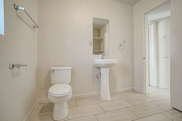a bathroom with a sink and a bathtub