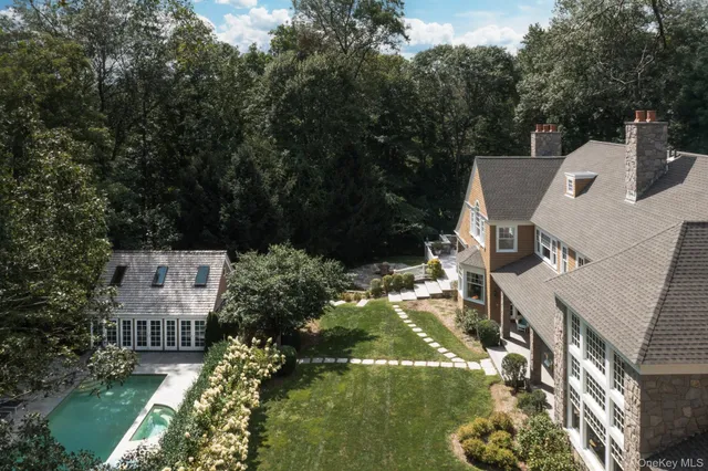an aerial view of residential house with outdoor space