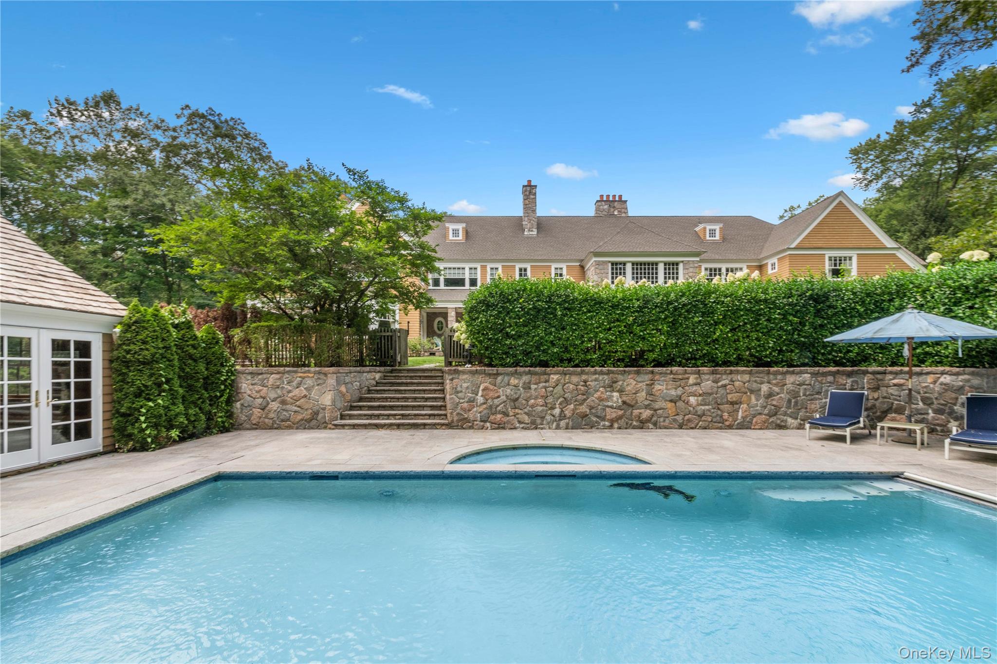 284 West Patent Road Bedford, NY 10549 - Photo 37 of 40 a view of swimming pool with a yard