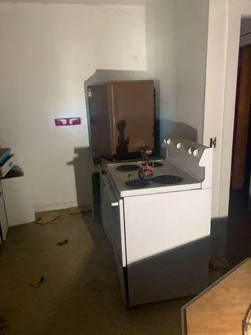 a view of large building with a yard