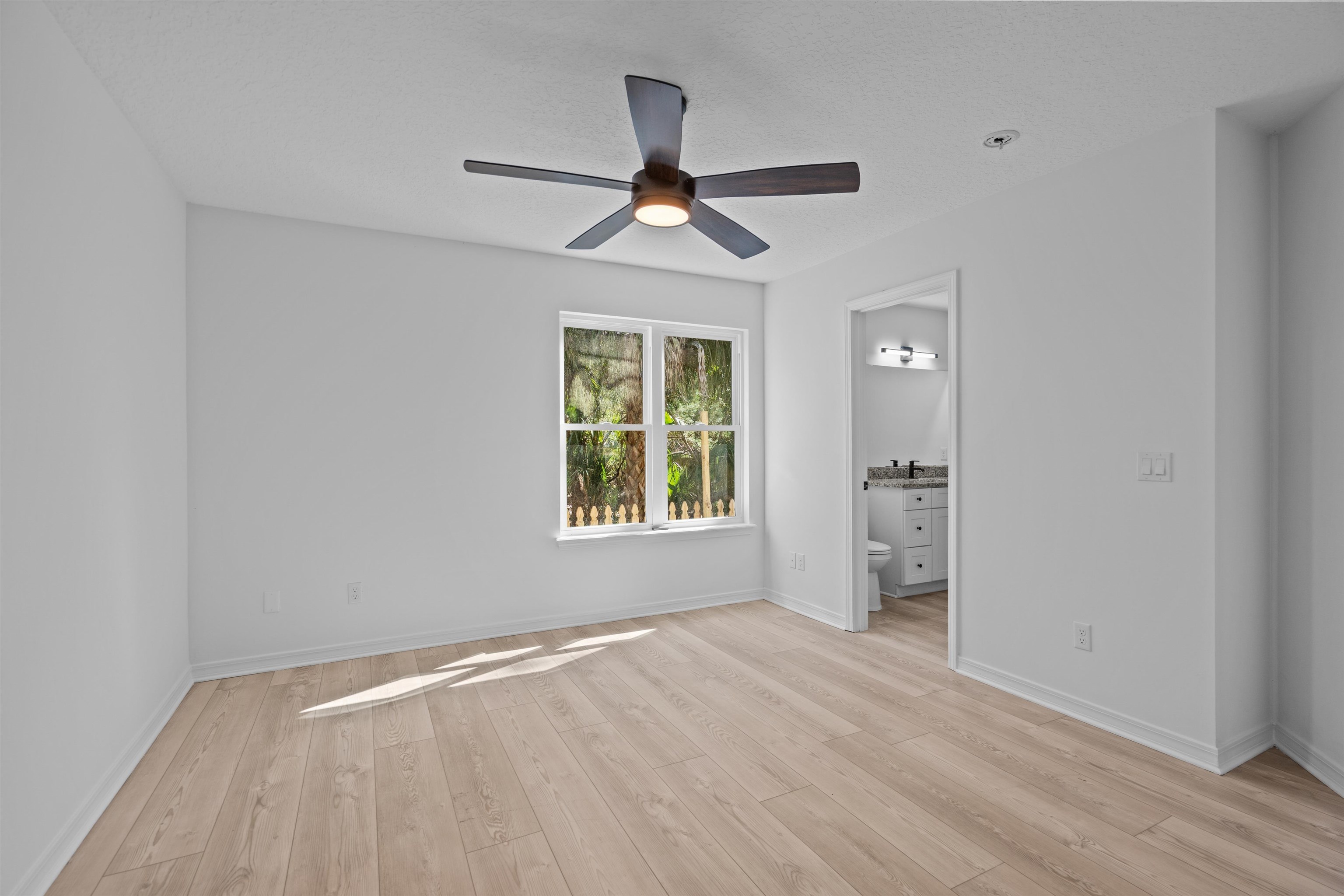 236 Nesmith Avenue St. Augustine, FL 32084 - Photo 27 of 40 wooden floor in an empty room with a window