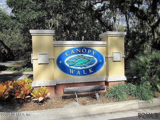 1400 Canopy Walk Lane, Unit 1413 Palm Coast, FL 32137 - Photo 2 of 17 Entry sign