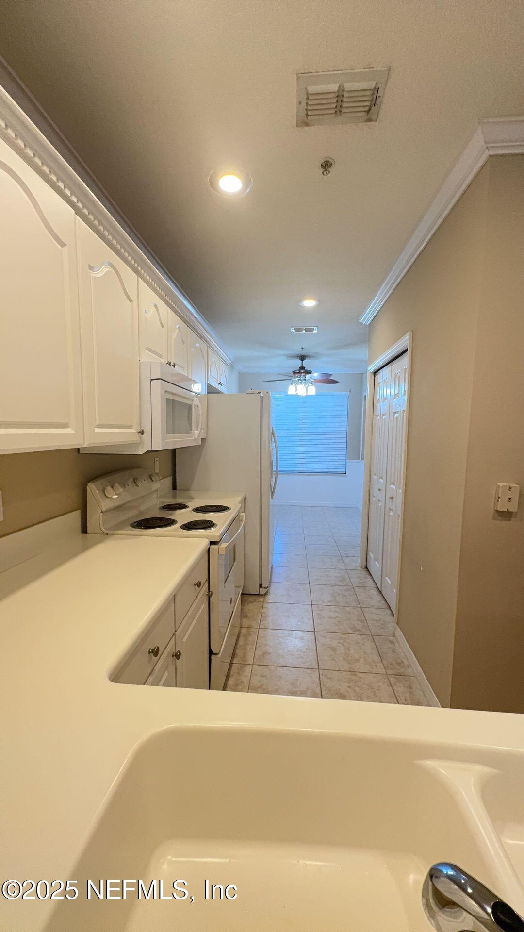 1400 Canopy Walk Lane, Unit 1413 Palm Coast, FL 32137 - Photo 4 of 17 kitchen