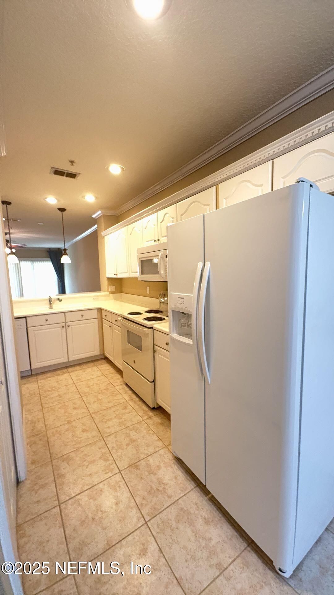 1400 Canopy Walk Lane, Unit 1413 Palm Coast, FL 32137 - Photo 6 of 17 kitchen 3