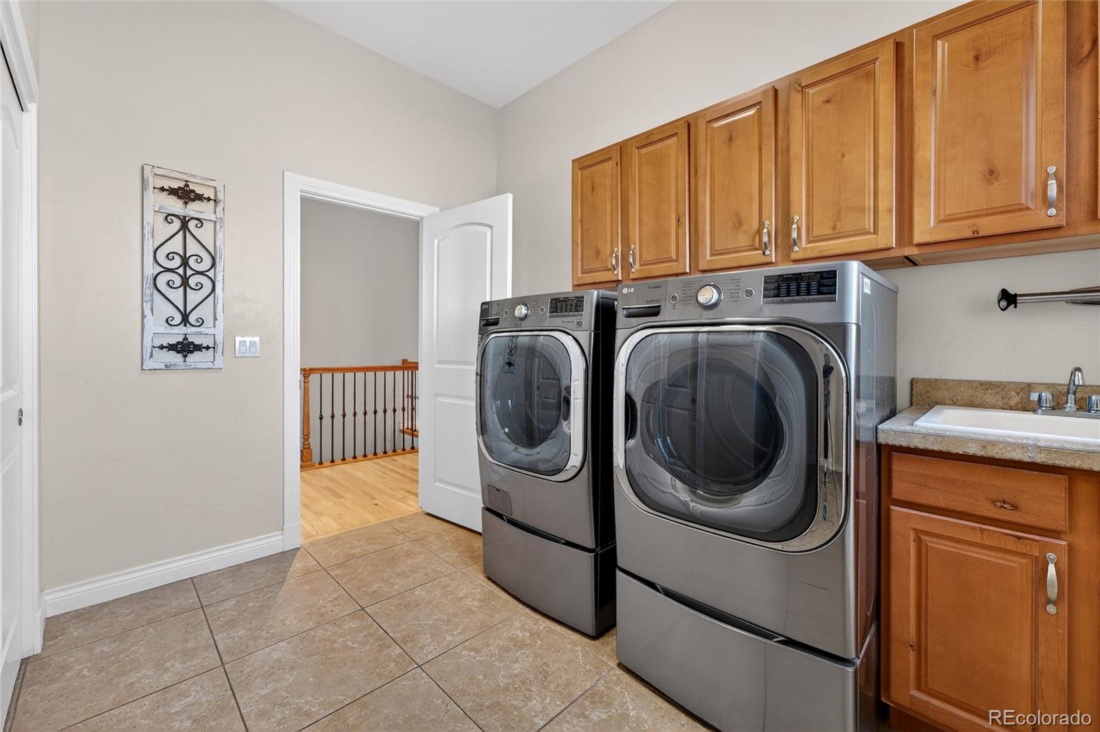 575 Howling Circle Elizabeth, CO 80107 - Photo 32 of 48 a utility room with dryer and washer