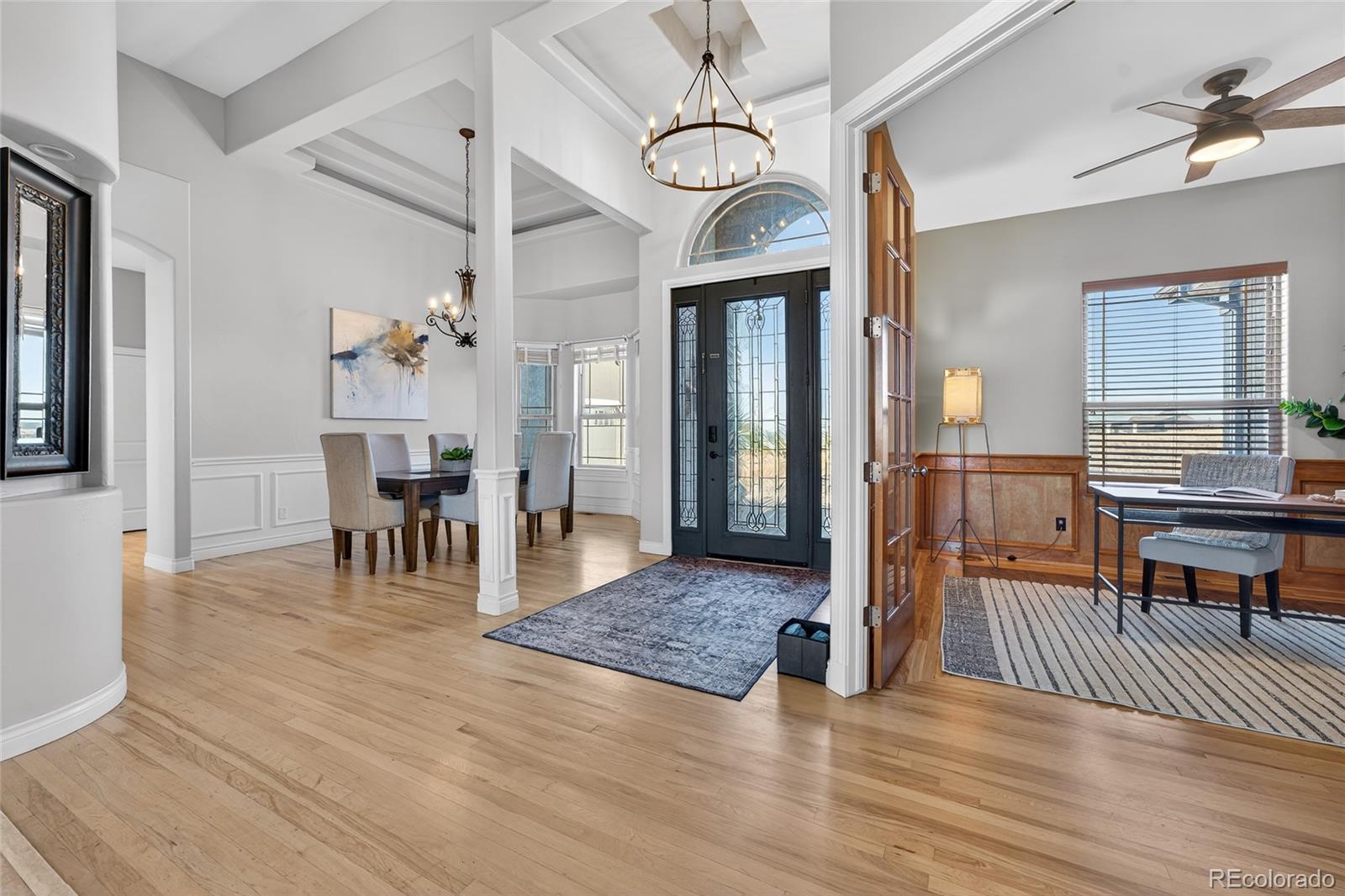 575 Howling Circle Elizabeth, CO 80107 - Photo 6 of 48 a view of a dining room with furniture window and wooden floor