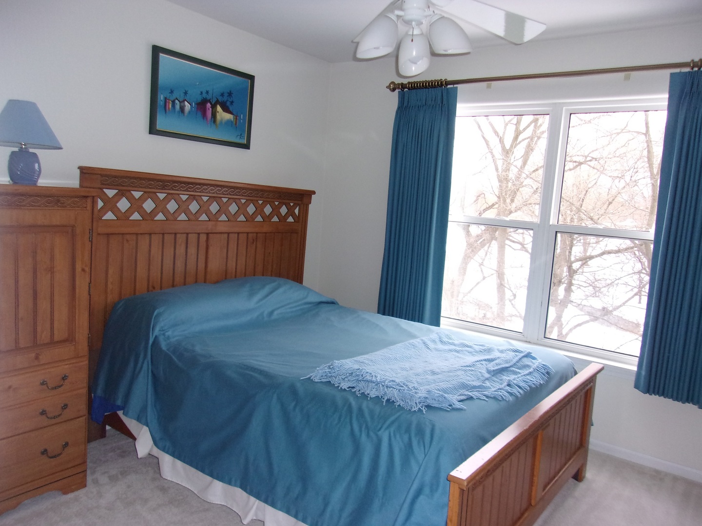 385 Aaron Lane Bolingbrook, IL 60440 - Photo 13 of 20 a bed sitting in a bedroom next to a window