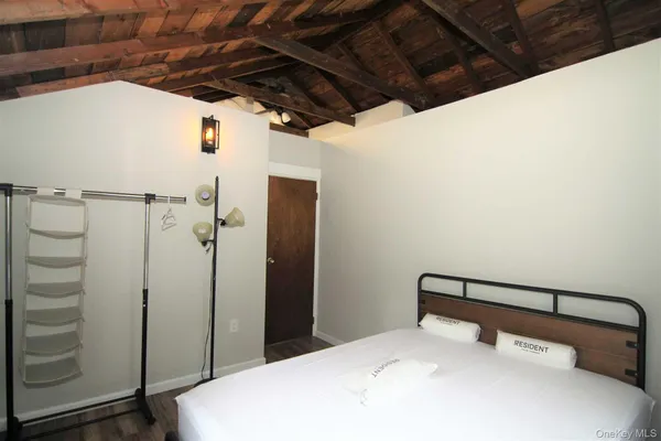 a bathroom with a shower and tub