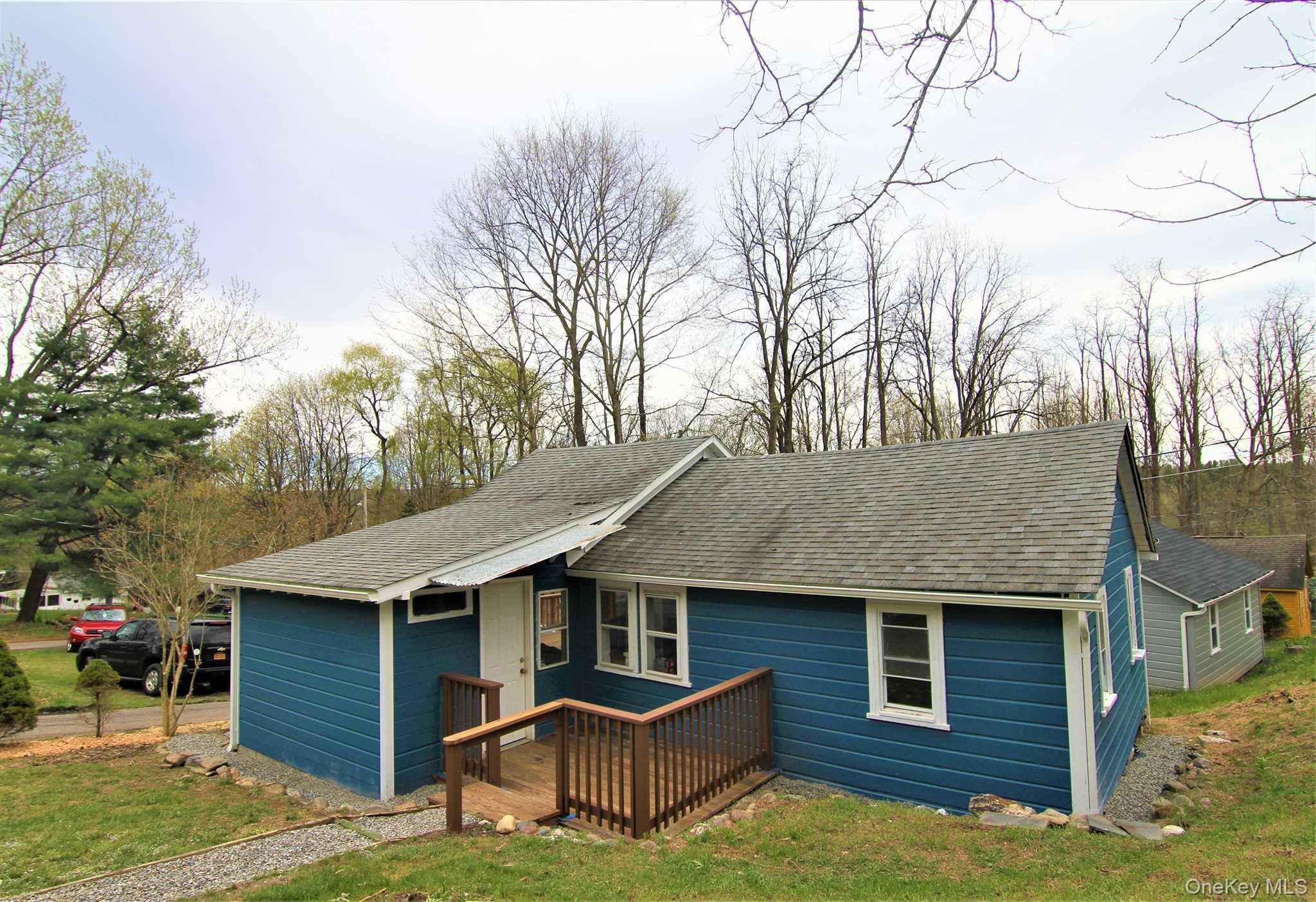 71 Miller Road, Unit 12 Hopewell Junction, NY 12533 - Photo 27 of 31 a front view of a house with garden