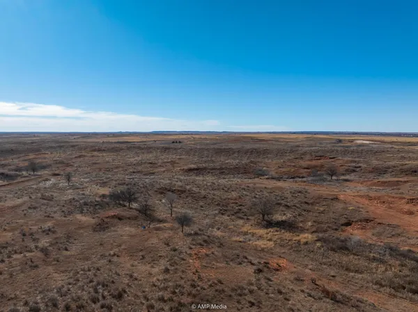 a view of beach and an ocean