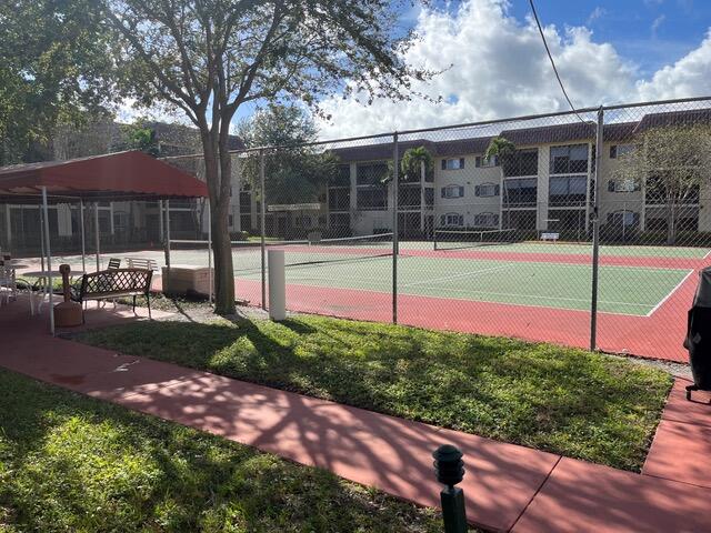 251 South Cypress Road, Unit 146 Pompano Beach, FL 33060 - Photo 13 of 20 a view of a backyard with plants