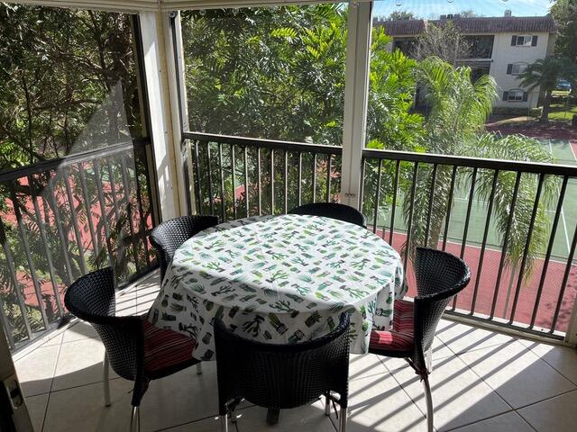 251 South Cypress Road, Unit 146 Pompano Beach, FL 33060 - Photo 3 of 20 a view of a balcony with chairs