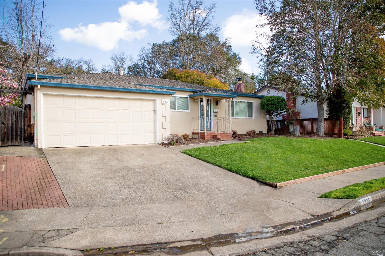 5335 Diane Way Santa Rosa, CA 95409 - Photo 1 of 1 a view of a house with a yard and large tree
