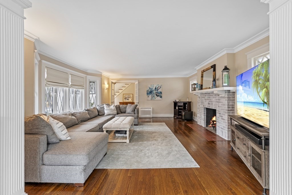 54 Pilgrim Road Marblehead, MA 01945 - Photo 8 of 32 a living room with furniture fireplace and flat screen tv