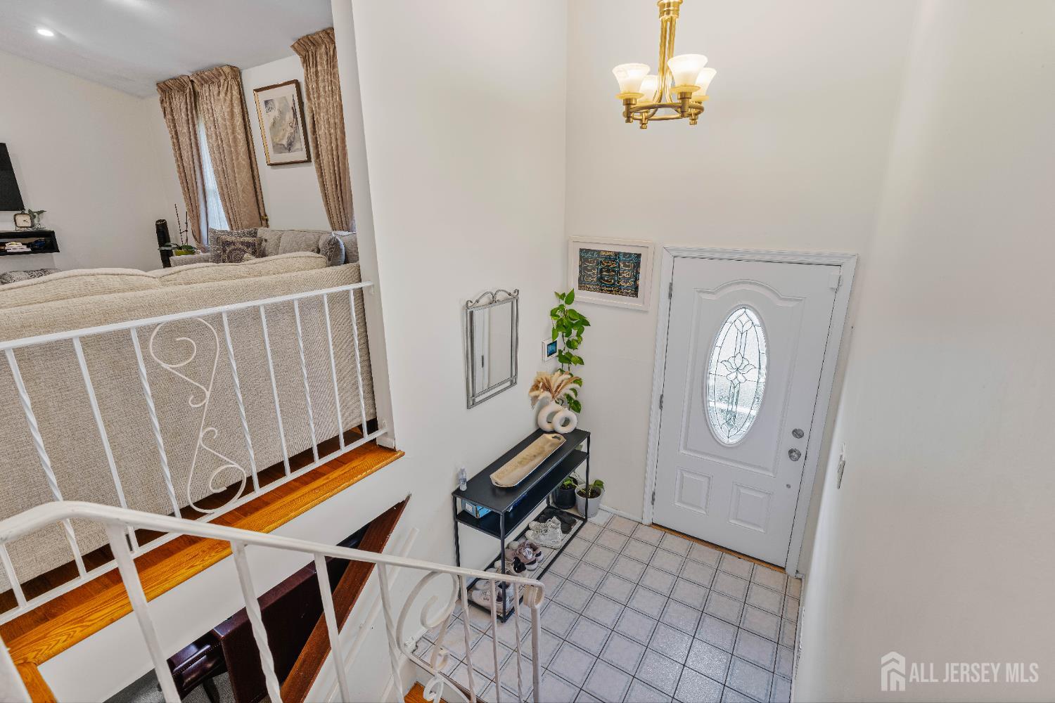 62 Harmon Road Edison, NJ 08837 - Photo 20 of 30 a view of an entryway with wooden floor