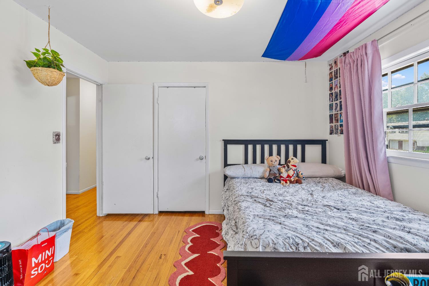 62 Harmon Road Edison, NJ 08837 - Photo 25 of 30 a bedroom with a bed and a window